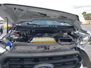 2022 Ford F-150 XL z VIN 1FTFX1E54NKD86627, wystawiony jako IAAI lot #41362024 z przebiegiem 32 712 mil mil oraz . Historia ofert i sprzedaży dostępna na DreamBid. Obrazek 10.