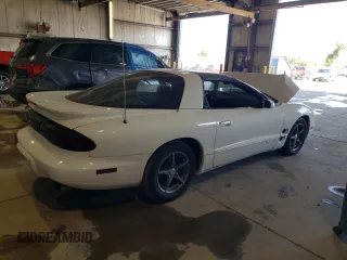 2001 Pontiac Firebird Formula z VIN 2G2FV22G212134322, wystawiony jako Copart lot #70813194 z przebiegiem Nie podano mil oraz Szkody całkowita. Historia ofert i sprzedaży dostępna na DreamBid. Obrazek 3.