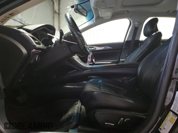 2016 Lincoln MKZ with VIN 3LN6L2JK4GR629425, listed as a Copart auction lot 52854645 with 127,981 mi miles and Salvage title. Bid and sale history available at DreamBid. Image 7.