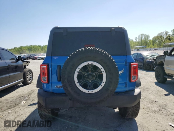 2024 Ford Bronco Big Bend z VIN 1FMDE7AH9RLA94869, wystawiony jako Copart lot #51317025 z przebiegiem 6 884 mil mil oraz Szkoda całkowita • Salvage title. Historia ofert i sprzedaży dostępna na DreamBid. Obrazek 6.