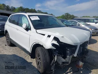 2021 Volkswagen Tiguan SE with VIN 3VV3B7AX7MM080266, listed as a IAAI auction lot 42062147 with 66,786 mi miles and . Bid and sale history available at DreamBid. Image 1.