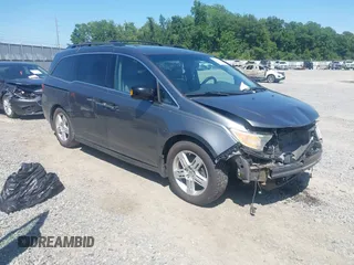 2013 Honda Odyssey Touring with VIN 5FNRL5H93DB041650, listed as a IAAI auction lot 42337109 with 179,954 mi miles and . Bid and sale history available at DreamBid. Image 1.