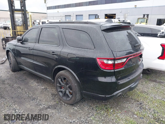 2023 Dodge Durango SRT 392 Premium with VIN 1C4SDJGJ6PC557943, listed as a IAAI auction lot 41478480 with 13,733 mi miles and . Bid and sale history available at DreamBid. Image 3.