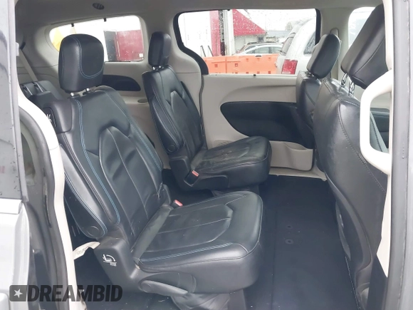 2021 Chrysler Pacifica Touring L with VIN 2C4RC1BG0MR543634, listed as a IAAI auction lot 41513467 with 148,010 mi miles and . Bid and sale history available at DreamBid. Image 8.