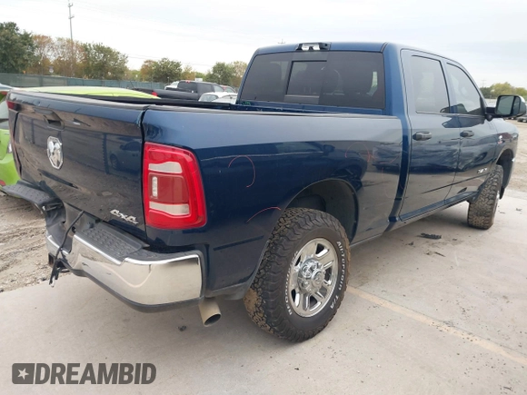 2021 Ram 2500 Tradesman with VIN 3C6UR5CL4MG584602, listed as a IAAI auction lot 40994669 with 68,000 mi miles. Bid and sale history available at carsss.com. Image 4.