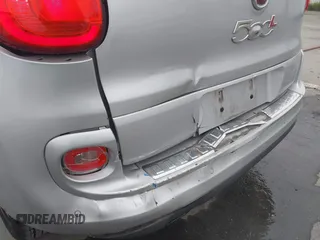2014 FIAT 500L Lounge z VIN ZFBCFACH8EZ005035, wystawiony jako IAAI lot #41824368 z przebiegiem 80 914 mil mil oraz . Historia ofert i sprzedaży dostępna na DreamBid. Obrazek 6.