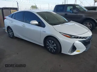 2022 Toyota Prius LE z VIN JTDKAMFP4N3223374, wystawiony jako IAAI lot #41699628 z przebiegiem 25 051 mil mil oraz . Historia ofert i sprzedaży dostępna na DreamBid. Obrazek 1.