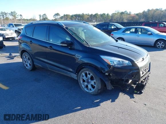 2016 Ford Escape Titanium with VIN 1FMCU0JX3GUA90420, listed as a IAAI auction lot 41850537 with 115,770 mi miles. Bid and sale history available at carsss.com. Image 1.