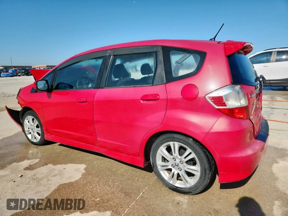 2010 Honda Fit Sport with VIN JHMGE8H4XAC033169, listed as a Copart auction lot 61175425 with 204,523 mi miles and Salvage title. Bid and sale history available at DreamBid. Image 2.