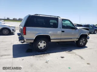 1999 Chevrolet Tahoe with VIN 3GNEK18RXXG190783, listed as a Copart auction lot 52666545 with 240,094 mi miles and Salvage Title. Bid and sale history available at carsss.com. Image 3.