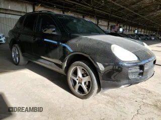 2006 Porsche Cayenne S with VIN WP1AB29P56LA66639, listed as a Copart auction lot 52097595 with 180,827 mi miles and Salvage title. Bid and sale history available at DreamBid. Image 4.