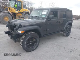 2021 Jeep Wrangler Unlimited Sport S with VIN 1C4HJXDN9MW822281, listed as a IAAI auction lot 41163183 with 23,665 mi miles and . Bid and sale history available at DreamBid. Image 2.