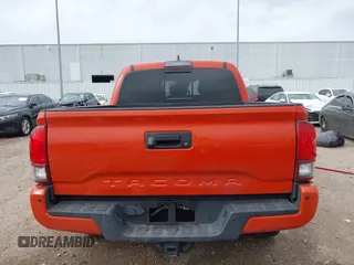 2018 Toyota Tacoma SR5 z VIN 3TMAZ5CN2JM076140, wystawiony jako IAAI lot #41913486 z przebiegiem 142 212 mil mil oraz . Historia ofert i sprzedaży dostępna na DreamBid. Obrazek 17.