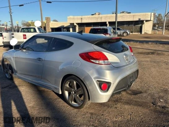 2013 Hyundai Veloster Turbo with VIN KMHTC6AE7DU115884, listed as a Copart auction lot 84959054 with 152,133 mi miles and Clean title. Bid and sale history available at DreamBid. Image 3.