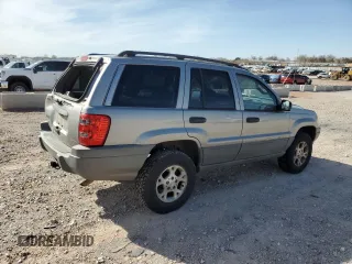 2002 Jeep Grand Cherokee with VIN 1J4GX38S82C178199, listed as a Copart auction lot 48996515 with 299,780 mi miles and Salvage title. Bid and sale history available at DreamBid. Image 3.