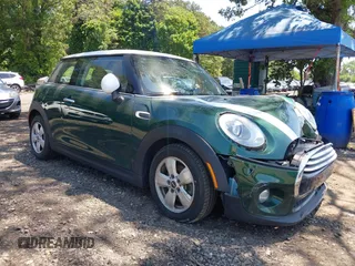 2014 MINI Hardtop with VIN WMWXM5C51ET932931, listed as a IAAI auction lot 42559902 with 88,022 mi miles and . Bid and sale history available at DreamBid. Image 1.