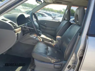 2004 Suzuki XL7 LX z VIN JS3TY92V144105911, wystawiony jako Copart lot #56744425 z przebiegiem 253 975 mil mil oraz Szkoda całkowita • Salvage title. Historia ofert i sprzedaży dostępna na DreamBid. Obrazek 7.