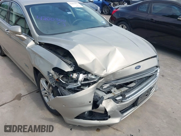 2015 Ford Fusion Energi Titanium with VIN 3FA6P0SU3FR114739, listed as a IAAI auction lot 42003011 with 120,553 mi miles. Bid and sale history available at carsss.com. Image 6.