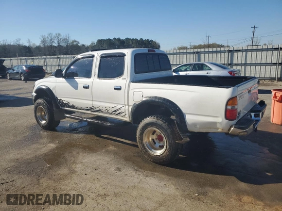 2002 Toyota Tacoma PreRunner with VIN 5TEGN92N02Z887650, listed as a Copart auction lot 49416255 with 290,615 mi miles and Salvage Title. Bid and sale history available at DreamBid. Image 2.
