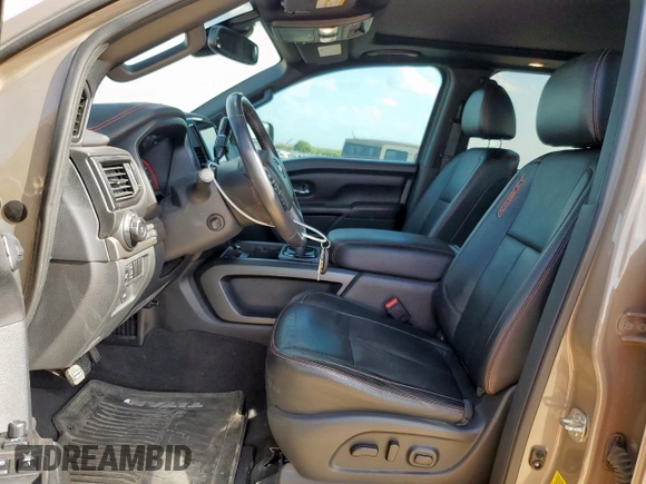 2021 Nissan Titan Pro-4X with VIN 1N6AA1EDXMN523826, listed as a Copart auction lot 61851765 with 85,783 mi miles and Salvage title. Bid and sale history available at DreamBid. Image 7.