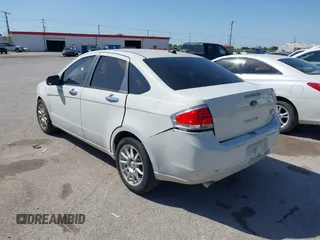 2010 Ford Focus SEL with VIN 1FAHP3HN2AW230823, listed as a IAAI auction lot 41982663 with 138,427 mi miles. Bid and sale history available at carsss.com. Image 3.