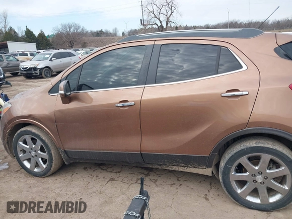 2016 Buick Encore Leather with VIN KL4CJCSB6GB553593, listed as a IAAI auction lot 41582660 with 95,713 mi miles and . Bid and sale history available at carsss.com. Image 14.