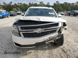 2015 Chevrolet Tahoe LT with VIN 1GNSCBKC9FR220574, listed as a Copart auction lot 54788555 with 244,491 mi miles and Salvage title. Bid and sale history available at DreamBid. Image 5.