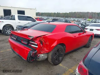 2021 Dodge Challenger SXT with VIN 2C3CDZAG9MH599603, listed as a IAAI auction lot 40934775 with 115,368 mi miles. Bid and sale history available at carsss.com. Image 4.