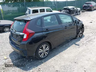 2015 Honda Fit EX-L z VIN 3HGGK5H85FM721566, wystawiony jako IAAI lot #42423777 z przebiegiem 138 825 mil mil oraz . Historia ofert i sprzedaży dostępna na DreamBid. Obrazek 4.