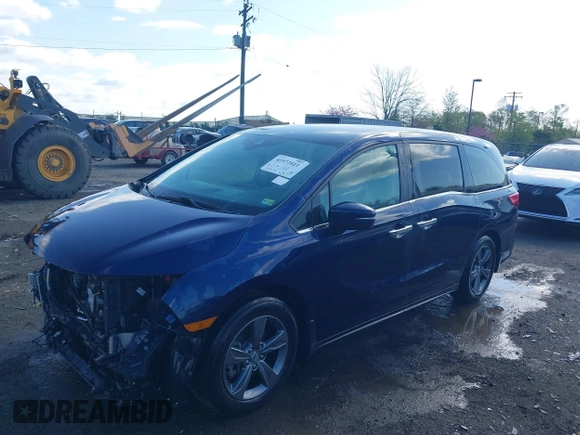 2022 Honda Odyssey EX with VIN 5FNRL6H56NB048063, listed as a IAAI auction lot 41972411 with 19,973 mi miles and . Bid and sale history available at DreamBid. Image 2.