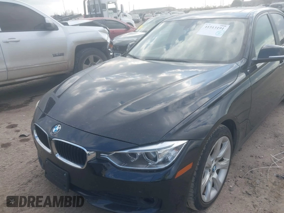 2014 BMW 3 Series 335i with VIN WBA3A9C54EF478025, listed as a IAAI auction lot 41513191 with 119,632 mi miles. Bid and sale history available at carsss.com. Image 2.