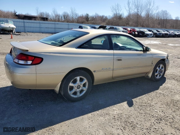 2000 Toyota Camry Solara SE with VIN 2T1CF28P0YC310353, listed as a Copart auction lot 48112195 with 128,128 mi miles and Clean Title. Bid and sale history available at carsss.com. Image 3.