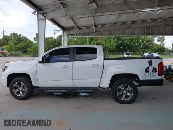 2020 Chevrolet Colorado 2WD Z71 with VIN 1GCGSDEN2L1159458, listed as a IAAI auction lot 42412924 with 90,011 mi miles and . Bid and sale history available at DreamBid. Image 15.