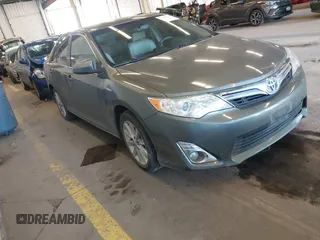 2012 Toyota Camry XLE z VIN 4T1BD1FK0CU005123, wystawiony jako IAAI lot #42116817 z przebiegiem 99 988 mil mil oraz . Historia ofert i sprzedaży dostępna na DreamBid. Obrazek 1.