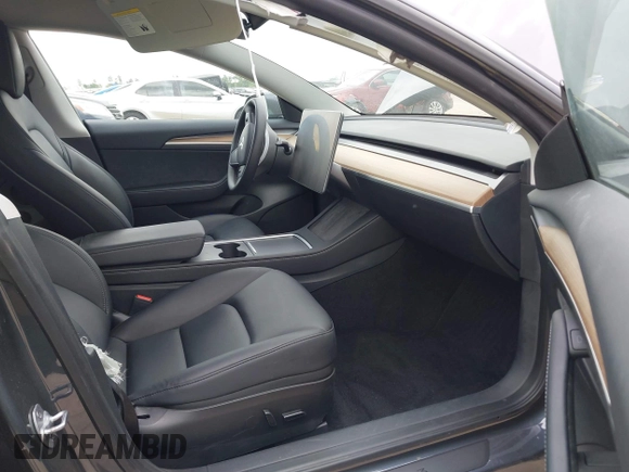 2023 Tesla Model 3 z VIN 5YJ3E1EA1PF642955, wystawiony jako IAAI lot #42121508 z przebiegiem 22 831 mil mil oraz . Historia ofert i sprzedaży dostępna na DreamBid. Obrazek 5.