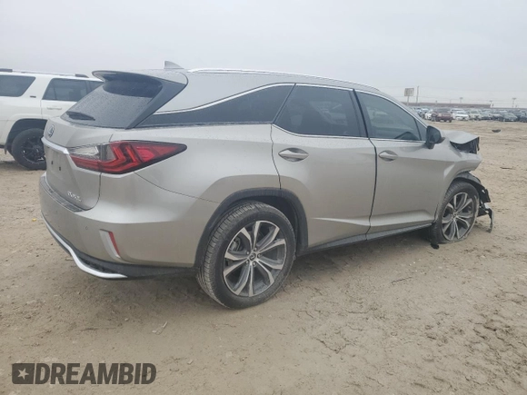 2021 Lexus RX 350L with VIN JTJHZKEA3M2022121, listed as a Copart auction lot 83263024 with 39,684 mi miles and Salvage title. Bid and sale history available at DreamBid. Image 3.