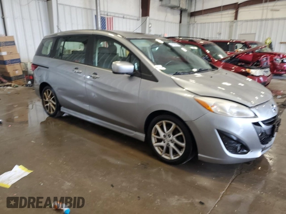 2012 Mazda 5 Grand Touring z VIN JM1CW2DL1C0142406, wystawiony jako Copart lot #48186495 z przebiegiem 198 419 mil mil oraz Nie do naprawy • Non repairable. Historia ofert i sprzedaży dostępna na DreamBid. Obrazek 4.