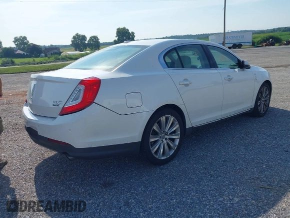 2013 Lincoln MKS EcoBoost with VIN 1LNHL9FT4DG614140, listed as a IAAI auction lot 42866991 with 126,487 mi miles and . Bid and sale history available at DreamBid. Image 4.