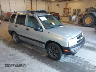 2003 Chevrolet Tracker z VIN 2CNBE13C336953203, wystawiony jako IAAI lot #42195810 z przebiegiem 123 503 mil mil oraz . Historia ofert i sprzedaży dostępna na DreamBid. Obrazek 1.
