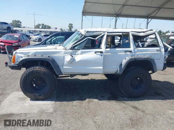 1991 Jeep Cherokee Country z VIN 1J4FJ78S7ML632675, wystawiony jako IAAI lot #42283175 z przebiegiem 116 062 mil mil oraz . Historia ofert i sprzedaży dostępna na DreamBid. Obrazek 14.