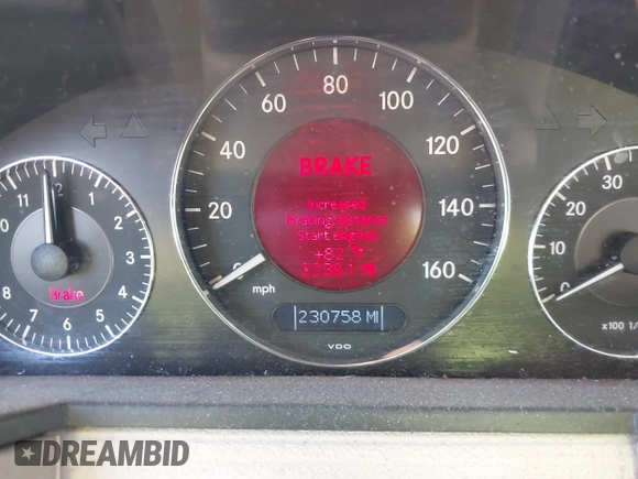 2003 Mercedes-Benz E-Class 3.2L with VIN WDBUF65J93X099223, listed as a IAAI auction lot 42033473 with 230,758 mi miles. Bid and sale history available at carsss.com. Image 7.