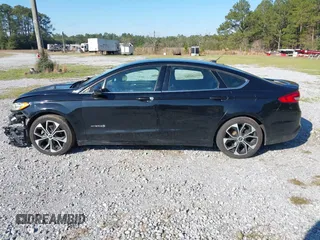 2018 Ford Fusion SE with VIN 3FA6P0LU7JR138906, listed as a IAAI auction lot 41573985 with 127,660 mi miles and . Bid and sale history available at DreamBid. Image 14.