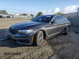 2019 BMW 5 Series 530e iPerformance with VIN WBAJA9C5XKB388307, listed as a Copart auction lot 49182735 with 73,819 mi miles and Salvage Title. Bid and sale history available at carsss.com. Image 1.