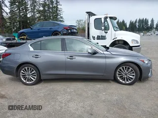 2021 Infiniti Q50 Luxe with VIN JN1EV7BR9MM755760, listed as a IAAI auction lot 41999322 with 60,978 mi miles and . Bid and sale history available at carsss.com. Image 13.