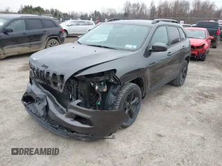 2016 Jeep Cherokee 75th Anniversary with VIN 1C4PJMCB0GW156076, listed as a IAAI auction lot 41946760 with 105,571 mi miles. Bid and sale history available at carsss.com. Image 23.