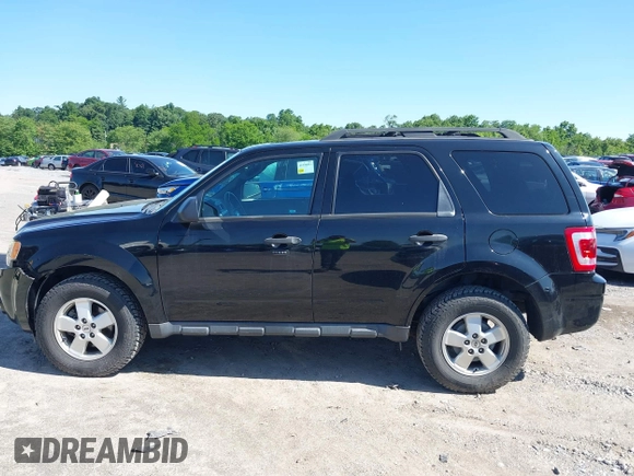 2012 Ford Escape XLT z VIN 1FMCU9D76CKC59030, wystawiony jako IAAI lot #42396412 z przebiegiem 101 223 mil mil oraz . Historia ofert i sprzedaży dostępna na DreamBid. Obrazek 14.