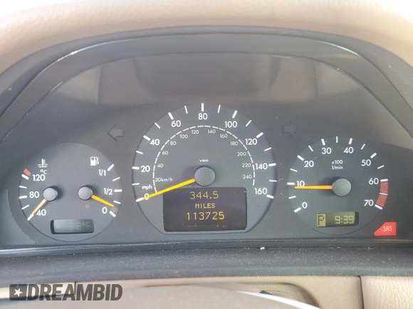 2002 Mercedes-Benz E-Class with VIN WDBJF82J12X062460, listed as a Copart auction lot 79264964 with 113,725 mi miles and Salvage Title. Bid and sale history available at carsss.com. Image 9.