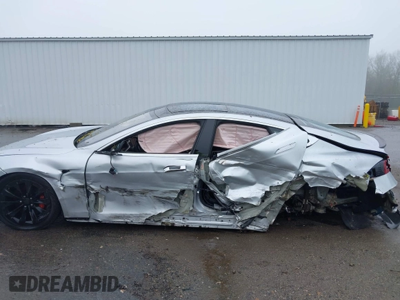 2014 Tesla Model S 60 with VIN 5YJSA1H18EFP30143, listed as a IAAI auction lot 42190505 with Not provided miles and . Bid and sale history available at DreamBid. Image 13.