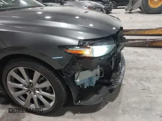 2020 Mazda 3 Premium with VIN 3MZBPBEM3LM123091, listed as a IAAI auction lot 41568213 with 68,515 mi miles and . Bid and sale history available at DreamBid. Image 18.