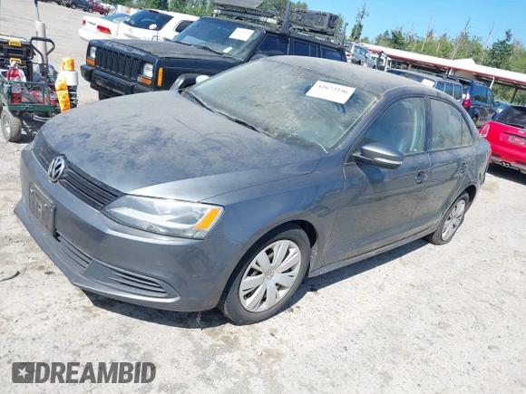 2014 Volkswagen Jetta SE z VIN 3VWD17AJ1EM238164, wystawiony jako IAAI lot #42672236 z przebiegiem 126 098 mil mil oraz . Historia ofert i sprzedaży dostępna na DreamBid. Obrazek 2.